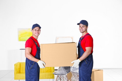 Boxes and furniture ready for same-day removals in a Twickenham property