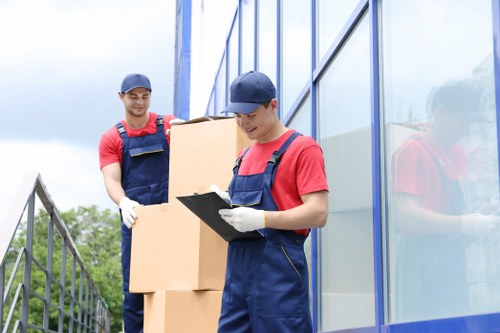 Staff completing a risk assessment before starting a house move