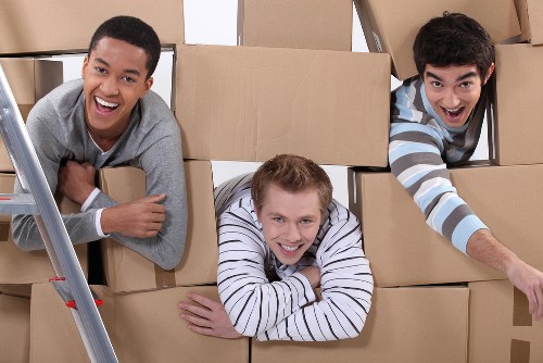 Student moving day in Twickenham with boxes and furniture transport