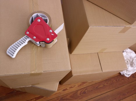 Preparation checklist and boxed household items ready for a Twickenham move