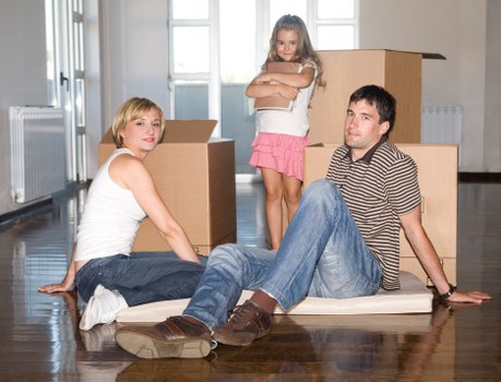 Packed boxes and furniture ready for local home removals